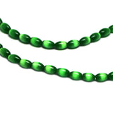 6X8mm Fiberoptic Cats Eye Oval/Rice Brt Green 68CE02