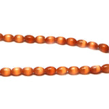 6X8mm Fiberoptic Cats Eye Oval/Rice Russet 68CE20